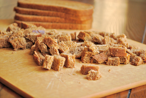 Rye Bread Cubes Rye-Stuffed Pork Chops with Apple-Thyme Pan Sauce recipe and image by Lacey Stevens-Baier, personal chef of Sweet Pea Chef