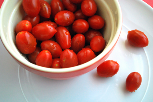 Bowl of Grape Tomatoes Bruschetta recipe and image by Lacey Stevens-Baier, personal chef of Sweet Pea Chef