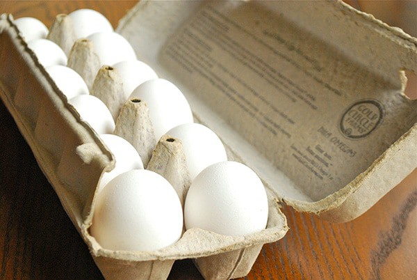 Overview of a carton of white eggs as mentioned in10 Foods That Cause Inflammation; eggs are inflammatory to some and not to others.