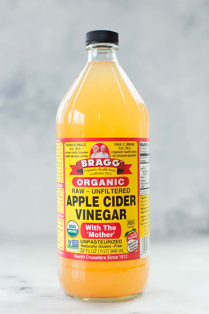 A bottle of organic apple cider vinegar.